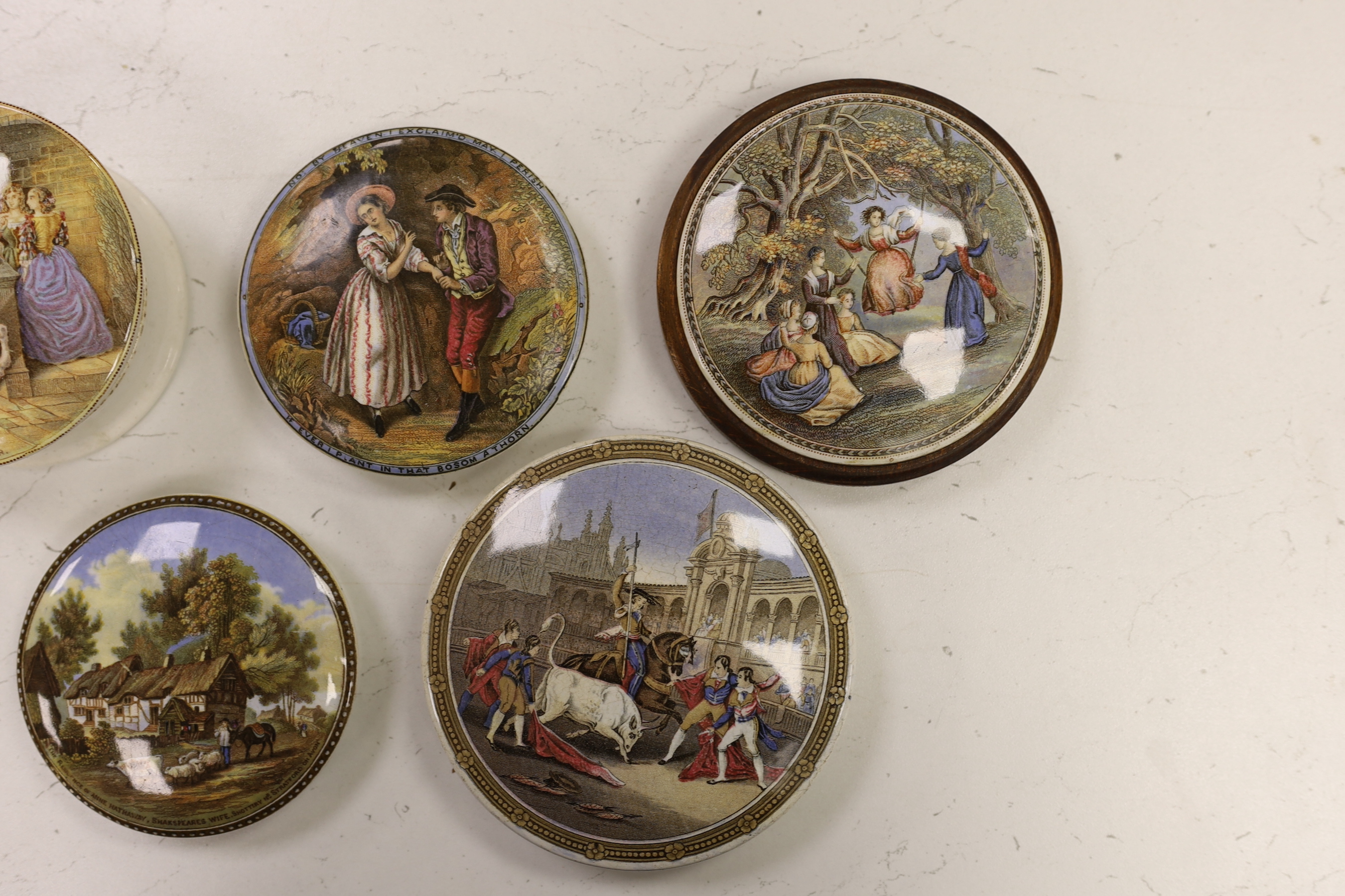 Seven various pot lids, The Cavalier, with base, War and five others